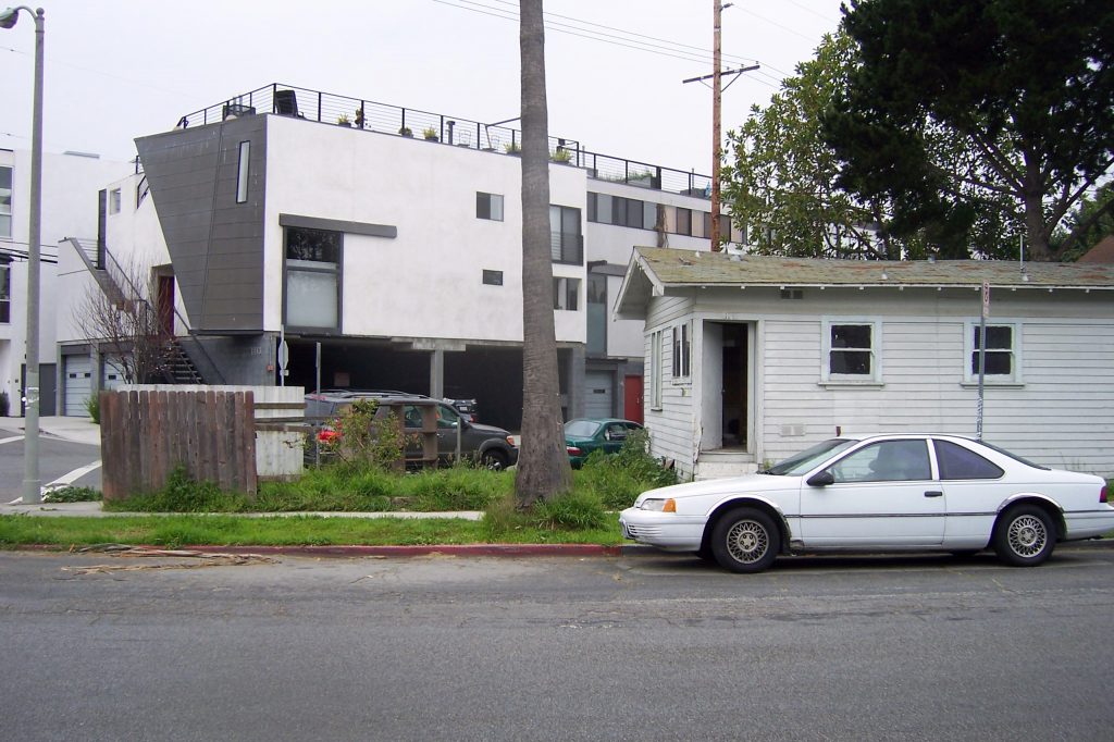 This corner lot is exposed to the rushing energy of street traffic, a less than desirable location.